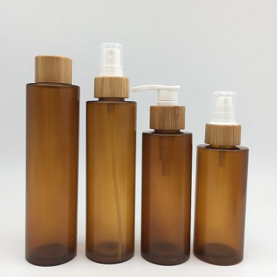 Custom Design 30ml 50ml 100ml 150ml Cosmetic Bottle Glass Lotion Bottle with Bamboo Pump Cap